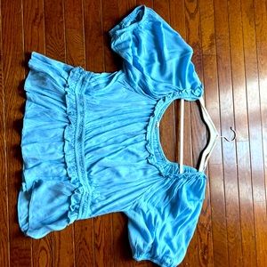 New without tags ARULA top. Beautiful light blue color. Fits true to size